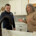 A man fixing an HVAC system | HVAC Company